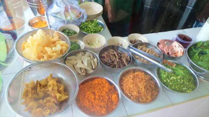 A selection of food for a noodle bowl in Saigon