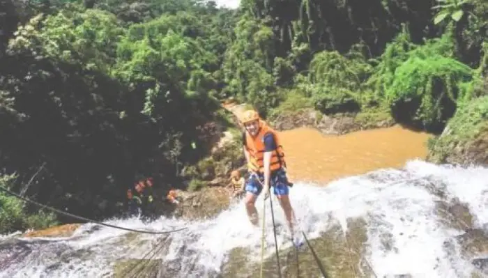 Canyoning down a waterfall in Dalat