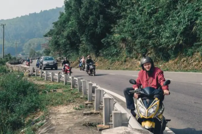 Riding the Hai Van Pass on a motorbike