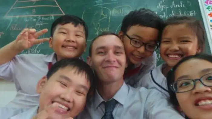 Jake with his grade 7 students in Ho Chi Minh City