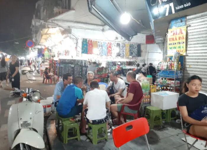Men drinking on the street in Hanoi
